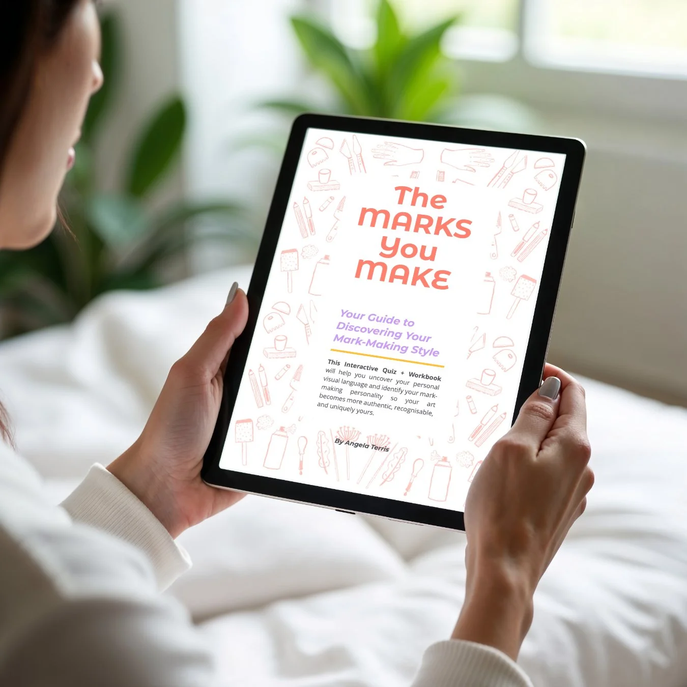 MockUp_PersonHoldingIPad_webres.jpg
