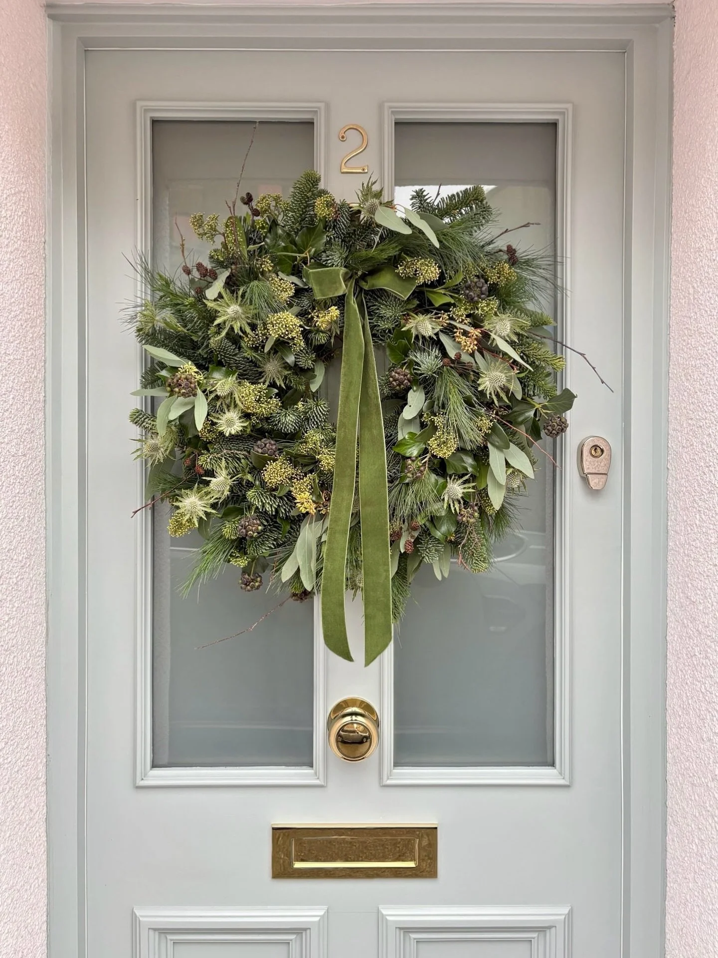 Green textures &amp; green velvet ribbon for our wreath this year ✨

#christmaswreath #christmasfoliage #doorwreath