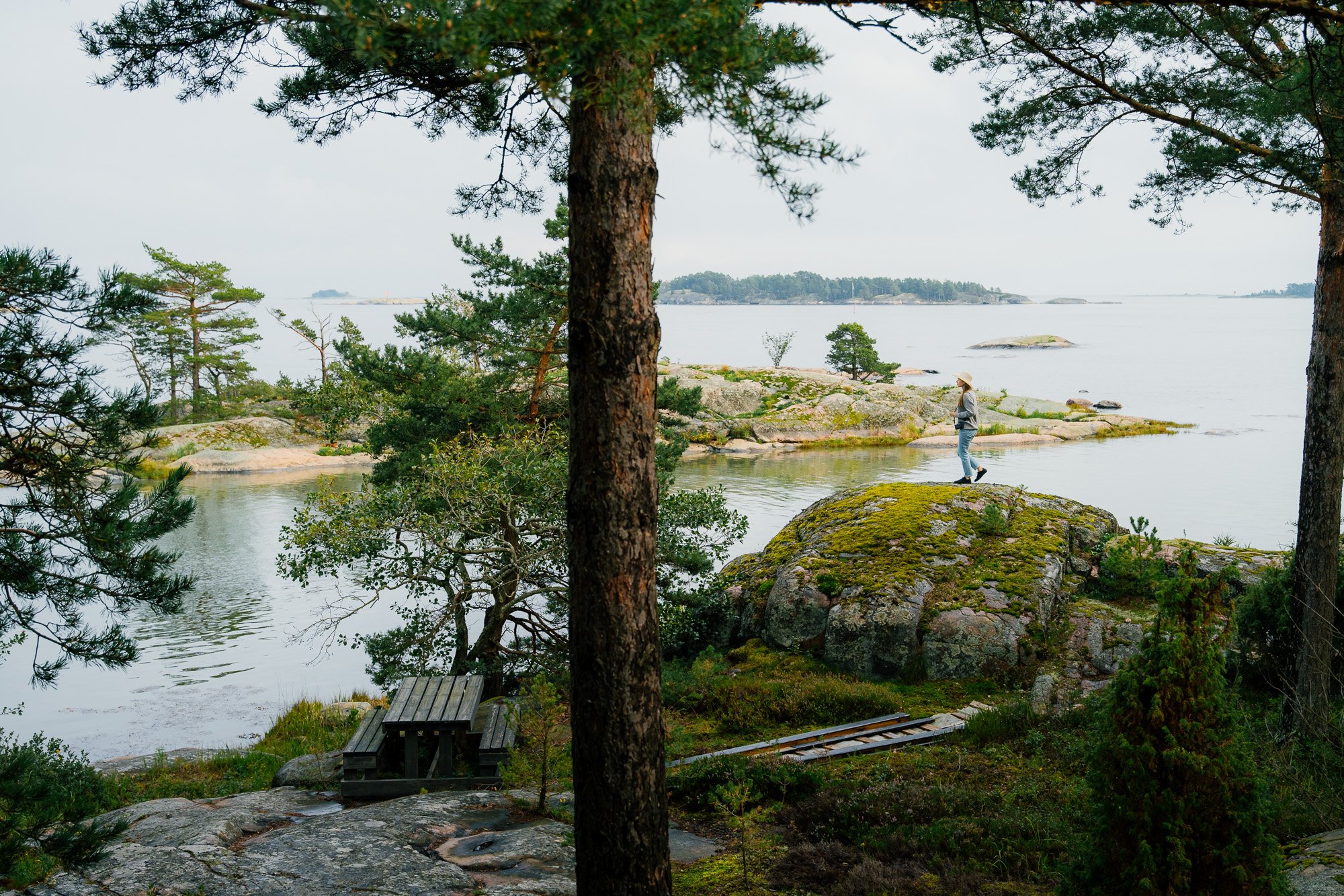 A person walking on the rocks of Finnish archipelago©Sami Laitinen.jpg