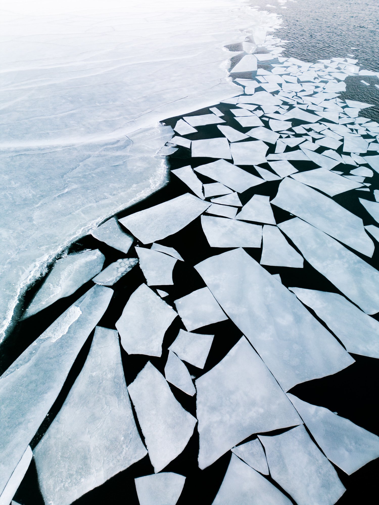 Forezen sea and huge ice plate that are cracked from the ice_Drone and earial landscape photography_Finland Finnish archipelago©Sami Laitinen.jpg