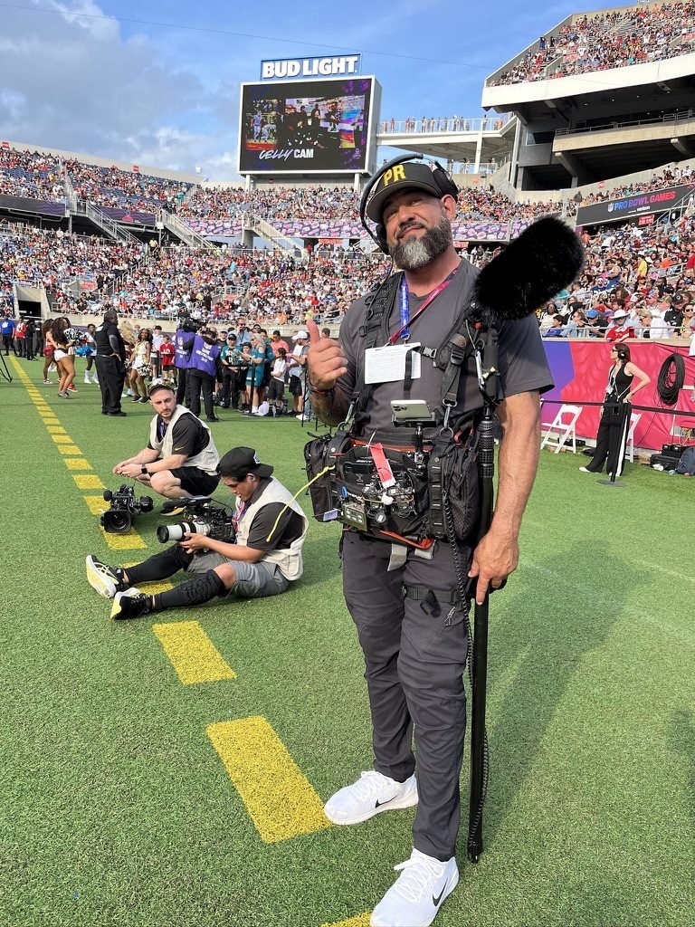 Edson Alvarez of High Five Sound on the sidelines at the Pro Bowl Games in Orlando with boom pole and sound bag