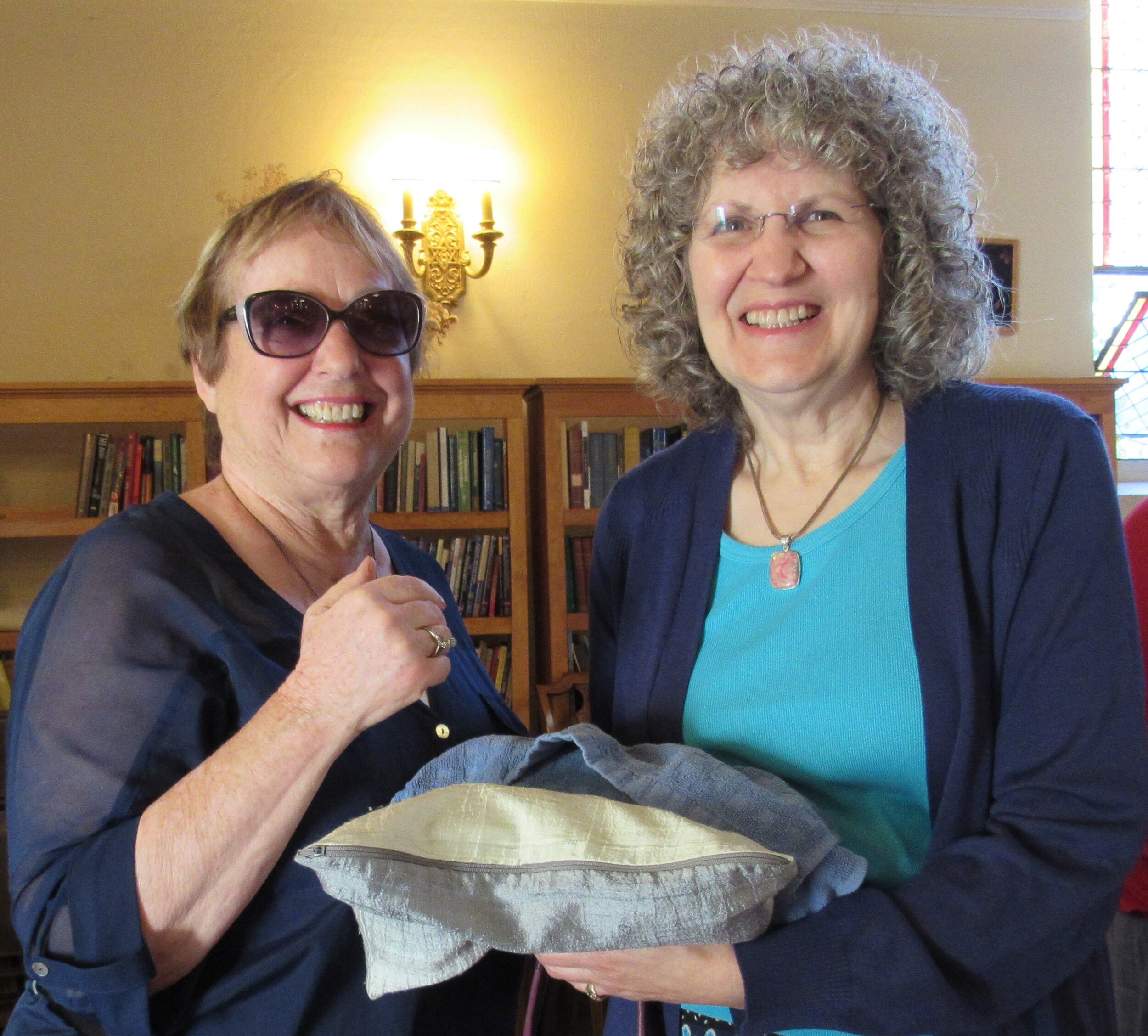 Gail & Melis blessing the Challah