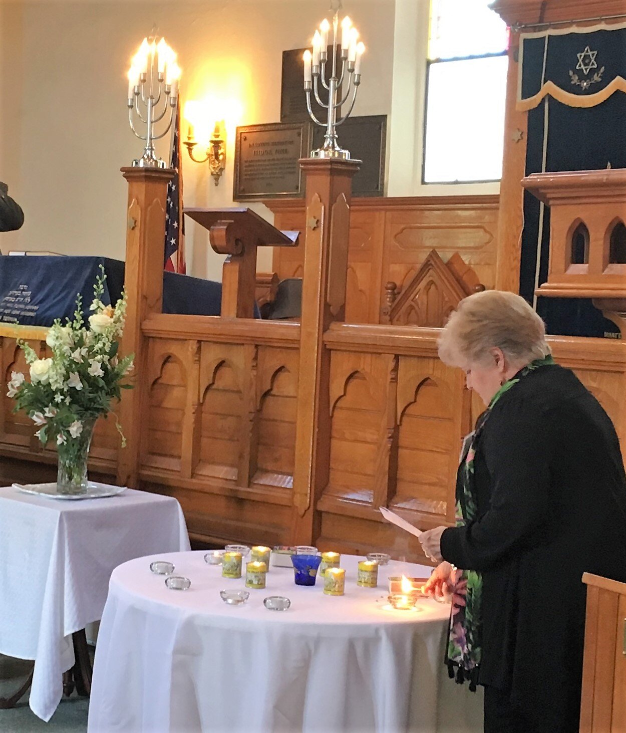 Lighting candles for the Holocaust Remembrance Service