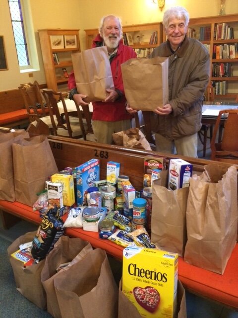 Stan & Leslie preparing donations for the Food Bank