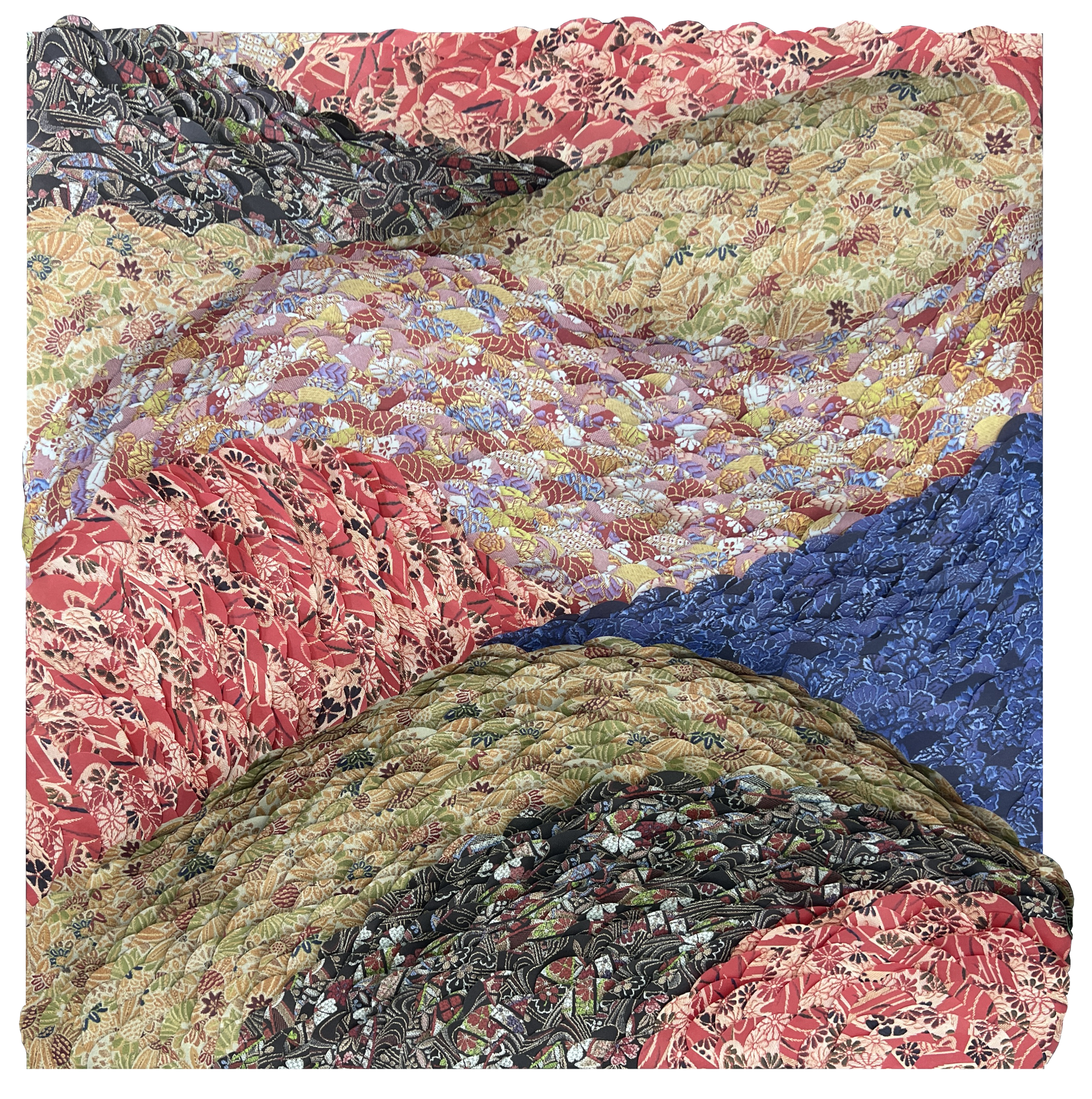 A collection of colorful, patterned quilts with floral and geometric designs, layered and arranged in a visually appealing manner.