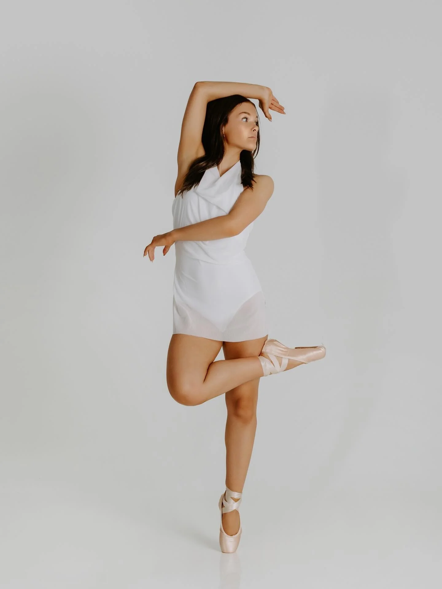 Clean lines. Real control. Every detail intentional.
Because when a dancer works this hard, the photos should show it.