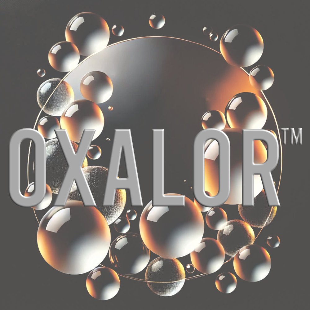 OXALOR™ logo over a stylized background of amber and silver bubbles, symbolizing the elegance and versatility of the premium perfumery base. created by Scentspiracy