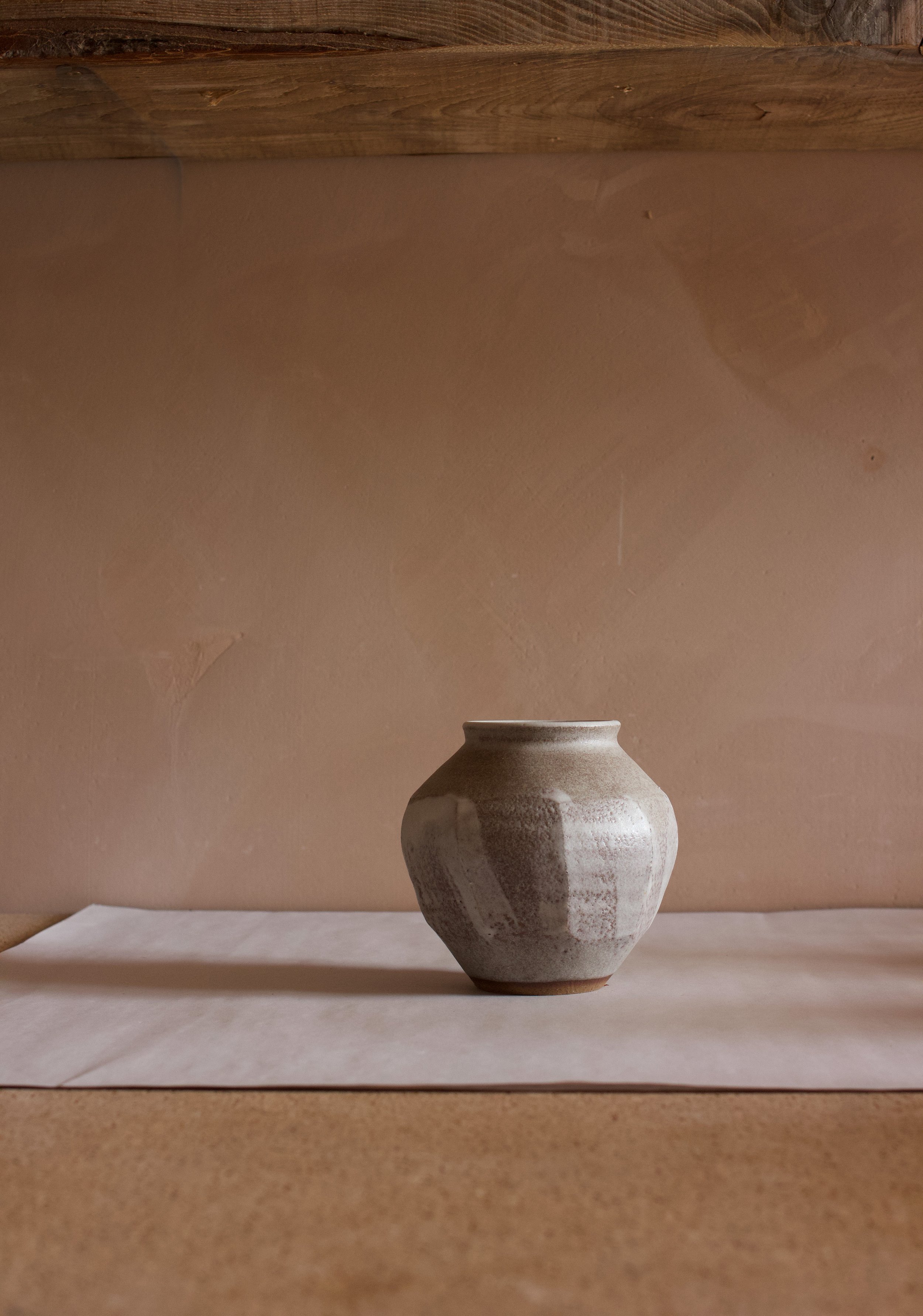 Wheel thrown and altered ceramic stoneware jar
