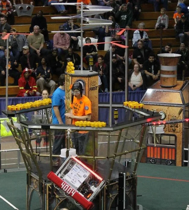 Logan and hanging robot.jpg