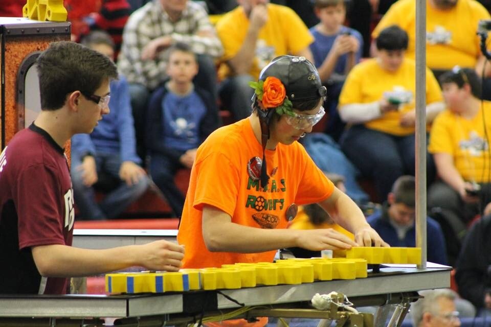 Logan placing a gear.jpg