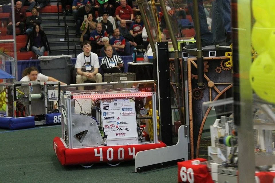 Robot delivering a gear.jpg