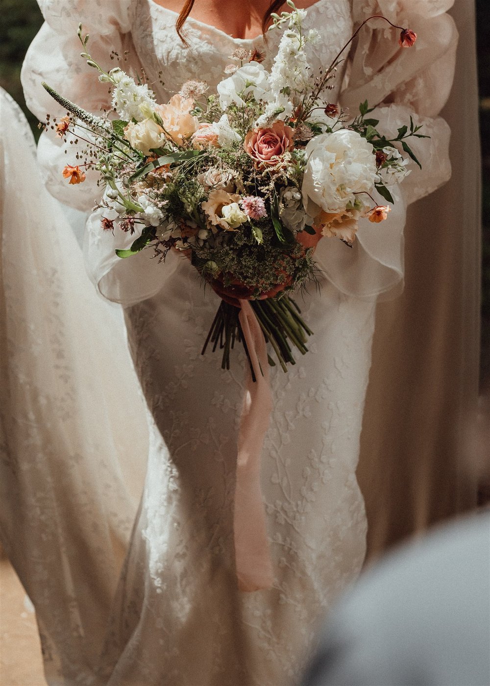 Handtied bridal bouquet with english country garden flowers