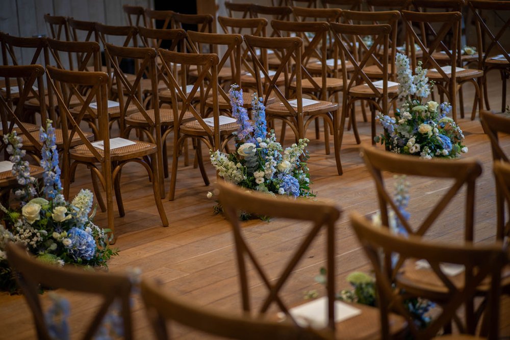 Aisle flowers at the wedding ceremony at primrose hill farm