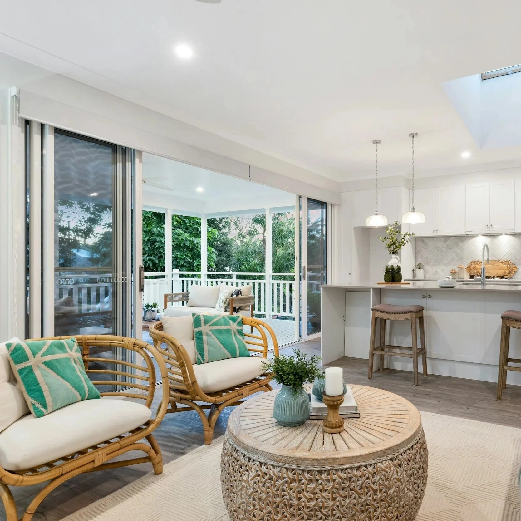 Modern open-concept Tampa home interior with bright walls, natural light, and durable paint finishes suited for humid Florida conditions.
