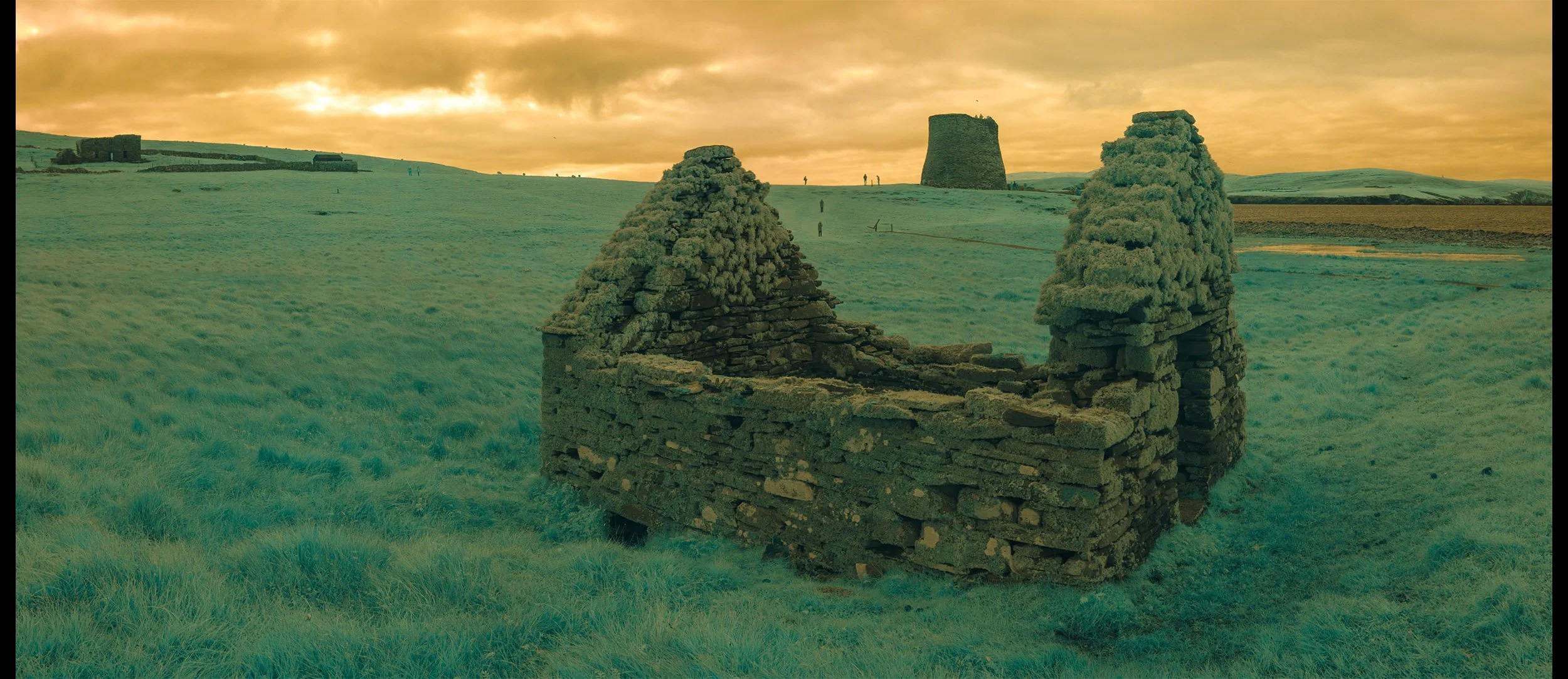 The Mousa Broch with a click mill in the foreground.