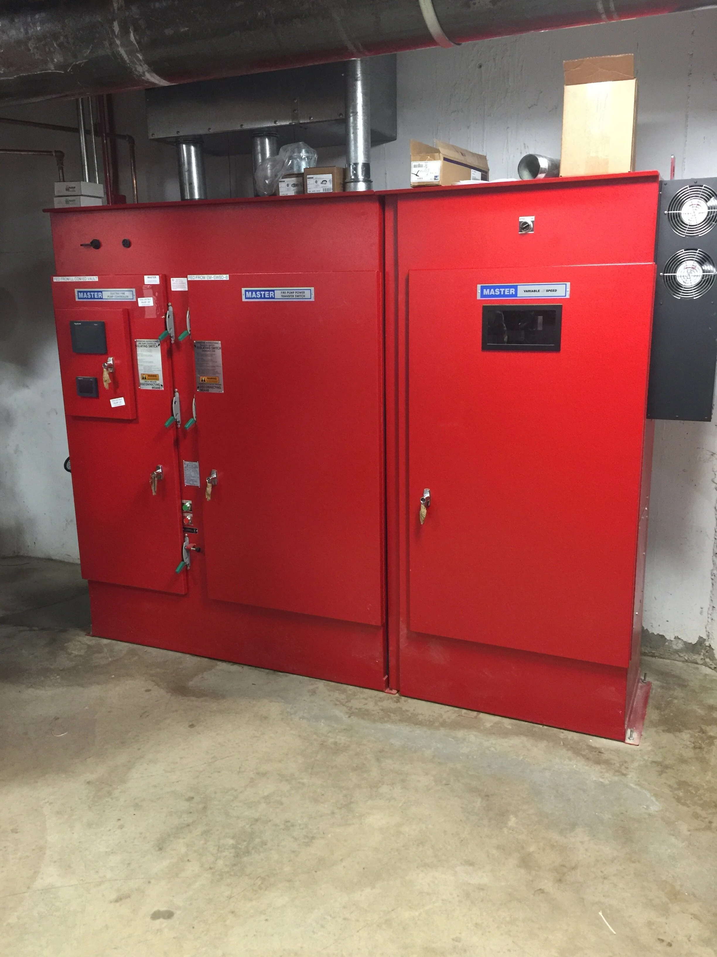 Variable speed fire pump control panels in a fire pump room..