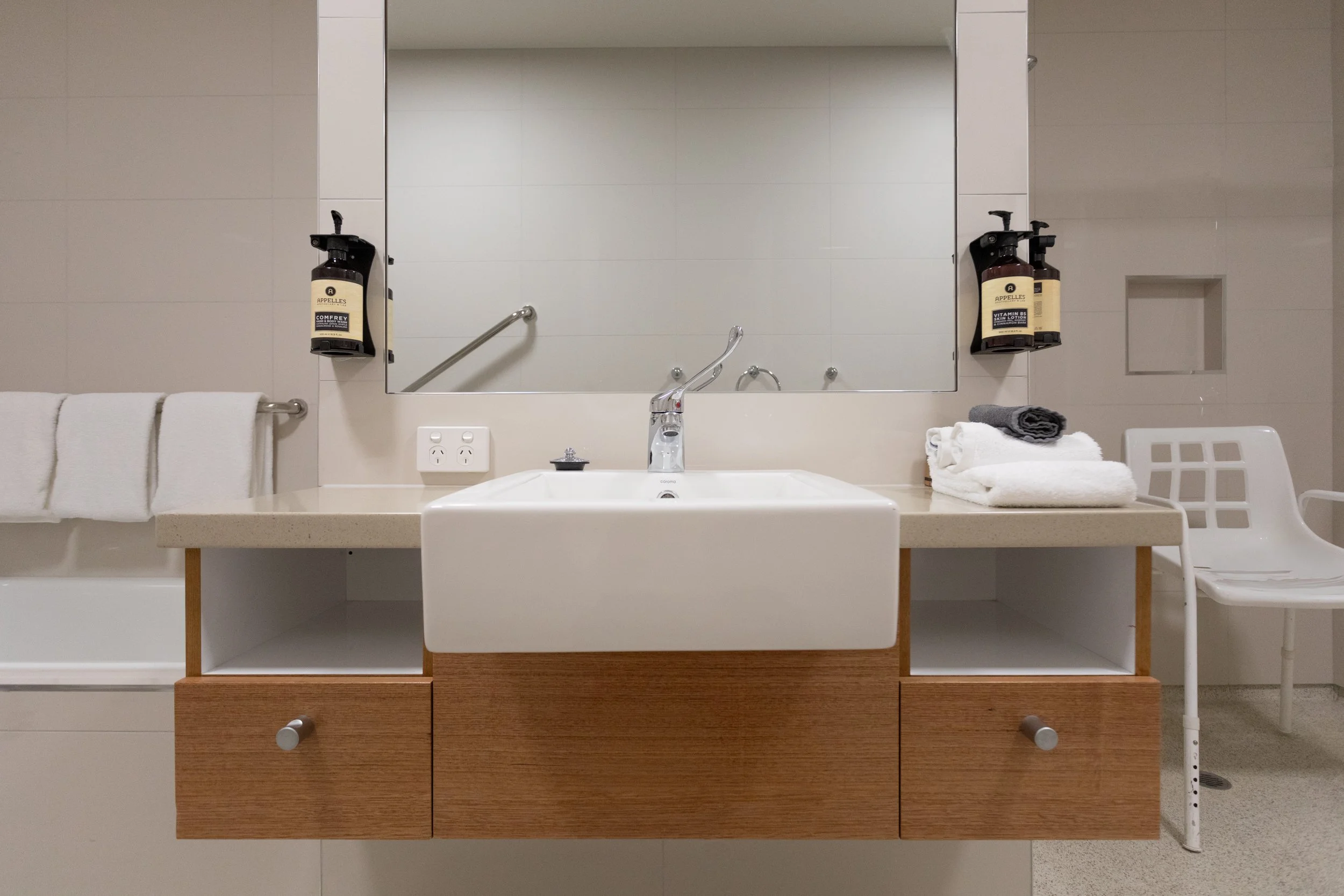 Accessible apartment bathroom with shower hair