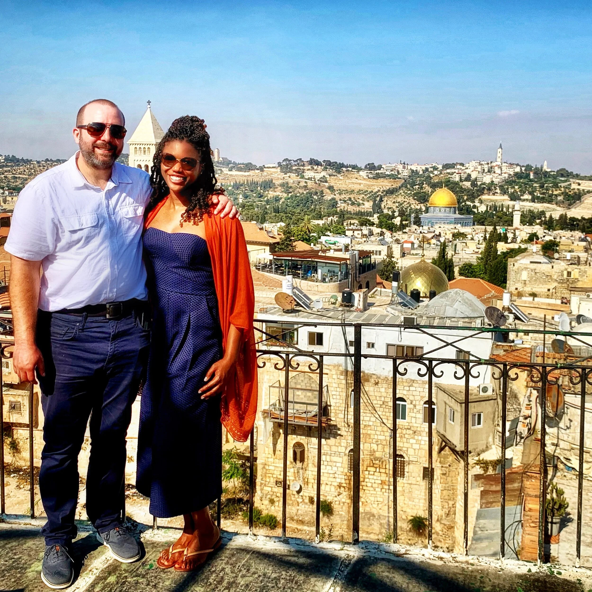 Jake &amp; Erica in the Old City of Jerusalem on the hotel rooftop where Mark Twain once stayed (The Dome of the Rock is prominent in the background — June 2019).