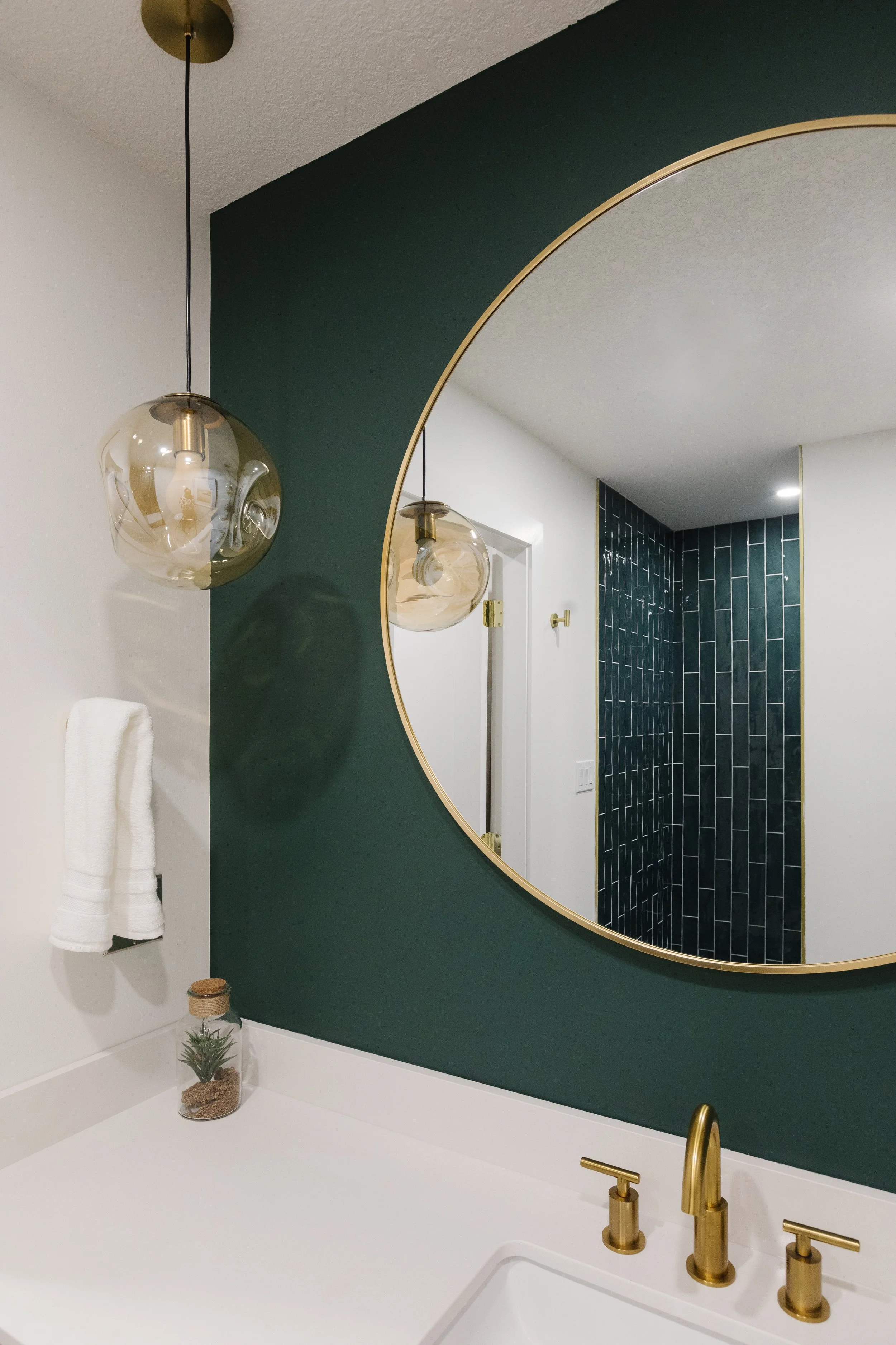 Luxury washroom design with gold faucet and mirror