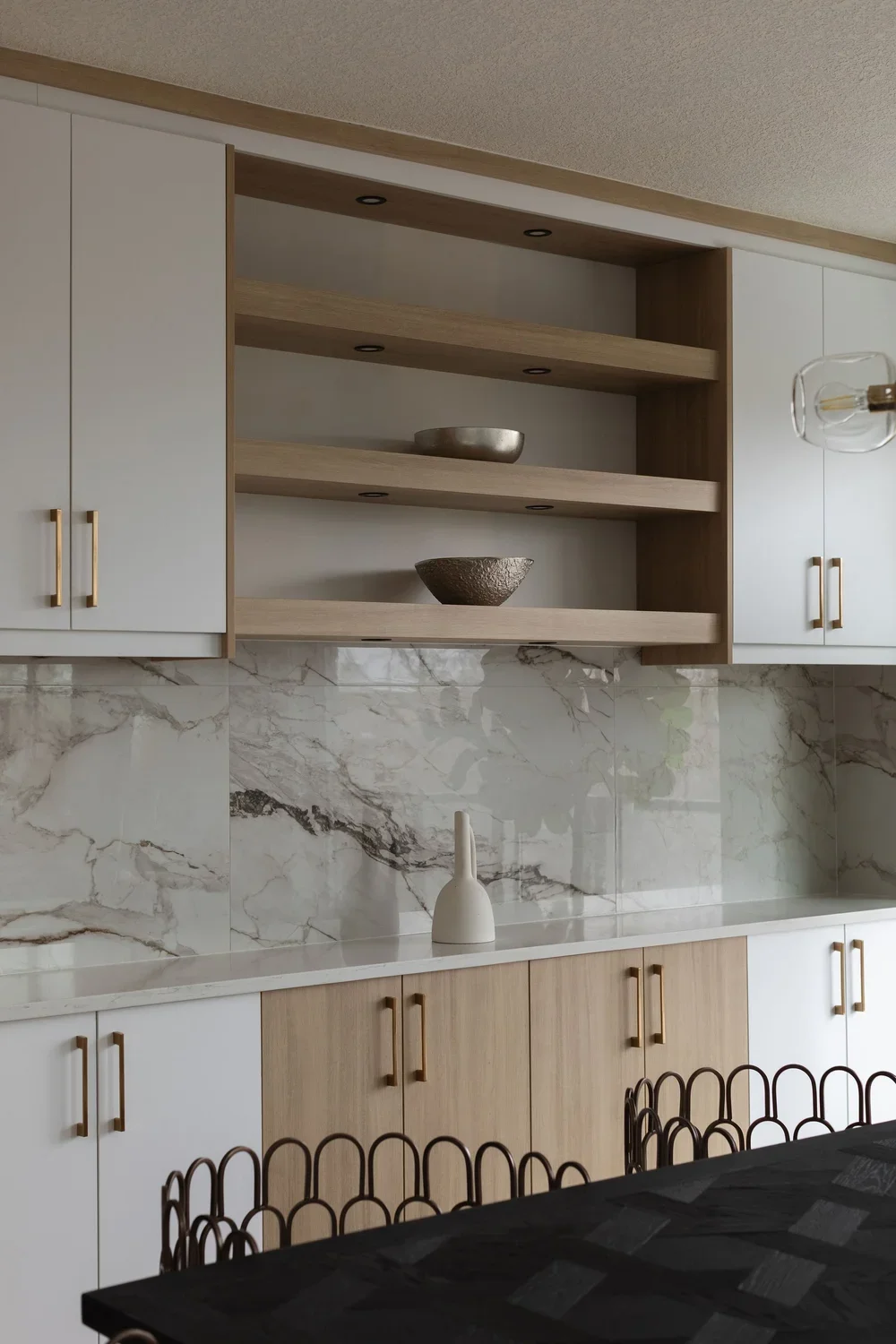 photo of a marble white kitchen with decorative home decor for furniture staging