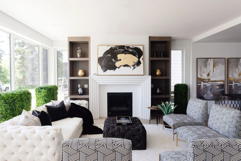 The Powerful Benefits of Staging Your Home Before Selling | ClubProperty.com 1 https://images.squarespace-cdn.com/content/v1/5e3663c8e354fa0b5adf0d73/62f7f97b-9651-48a1-bca6-b120bdce8fe9/white-and-black-living-room-home-staging-with-modern-furniture-and-a-fireplace.jpg?utm_source=chatgpt.com