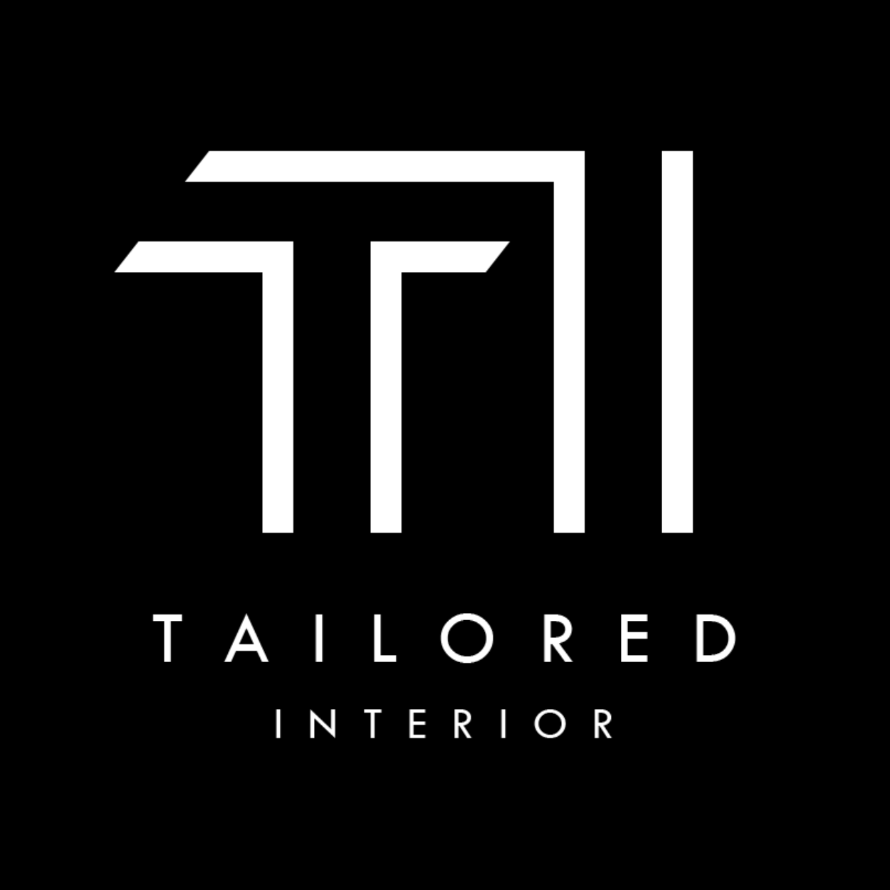 Graphic of a black and white Tailored Interior logo