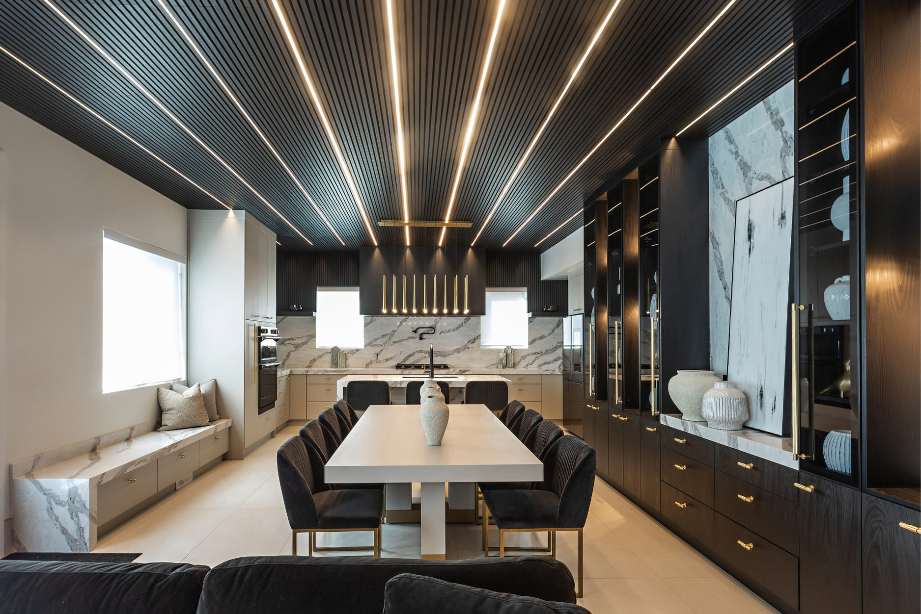 Black and white modern kitchen with integrated lights in ceiling