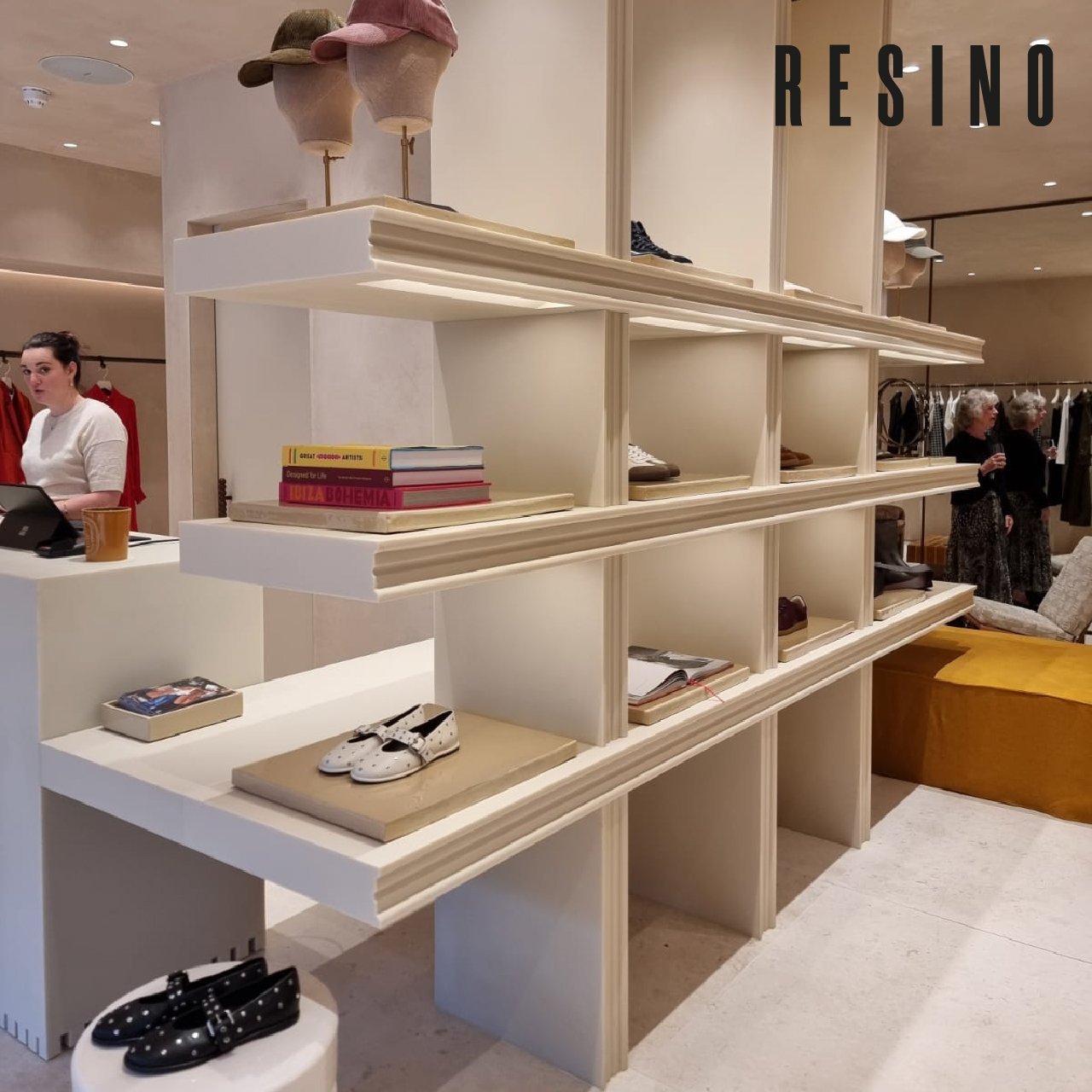 This stunning shelving unit and cash desk combination was created for a women's fashion brand in central London.
All visible surfaces are seamless epoxy resin with no visible joins, the custom colour is a cream/ivory with a very slight translucency a