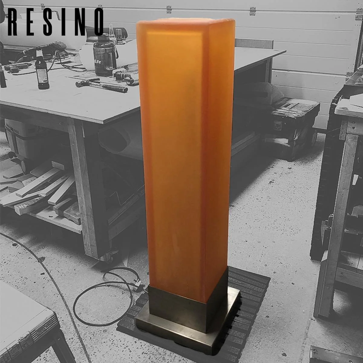 We made these 2 floor standing lamp variations around 4 years ago for a restaurant in Spain. 
Solid cast resin walls, one round and one square, both with colour change LED internal lighting and an anodic bronze base.