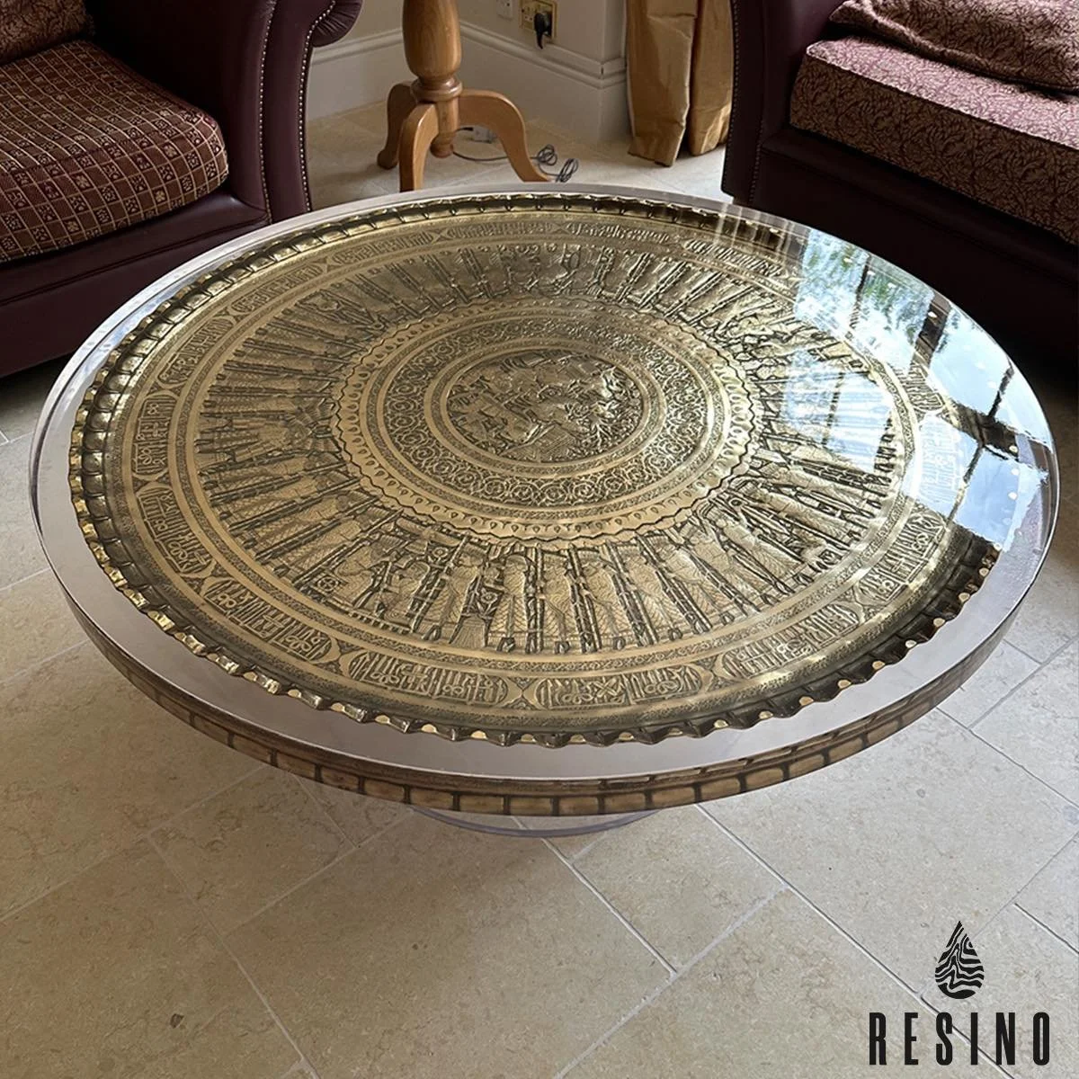 A huge hand carved brass tray (from Tehran in the 1950&rsquo;s) encased in 65mm of clear resin!
We also produced the hollow resin cylinder base. 
.
.
.
#resinfurniture #coffeetables #coffeetable #furniture #resin #resintable #epoxytable #epoxy #resin
