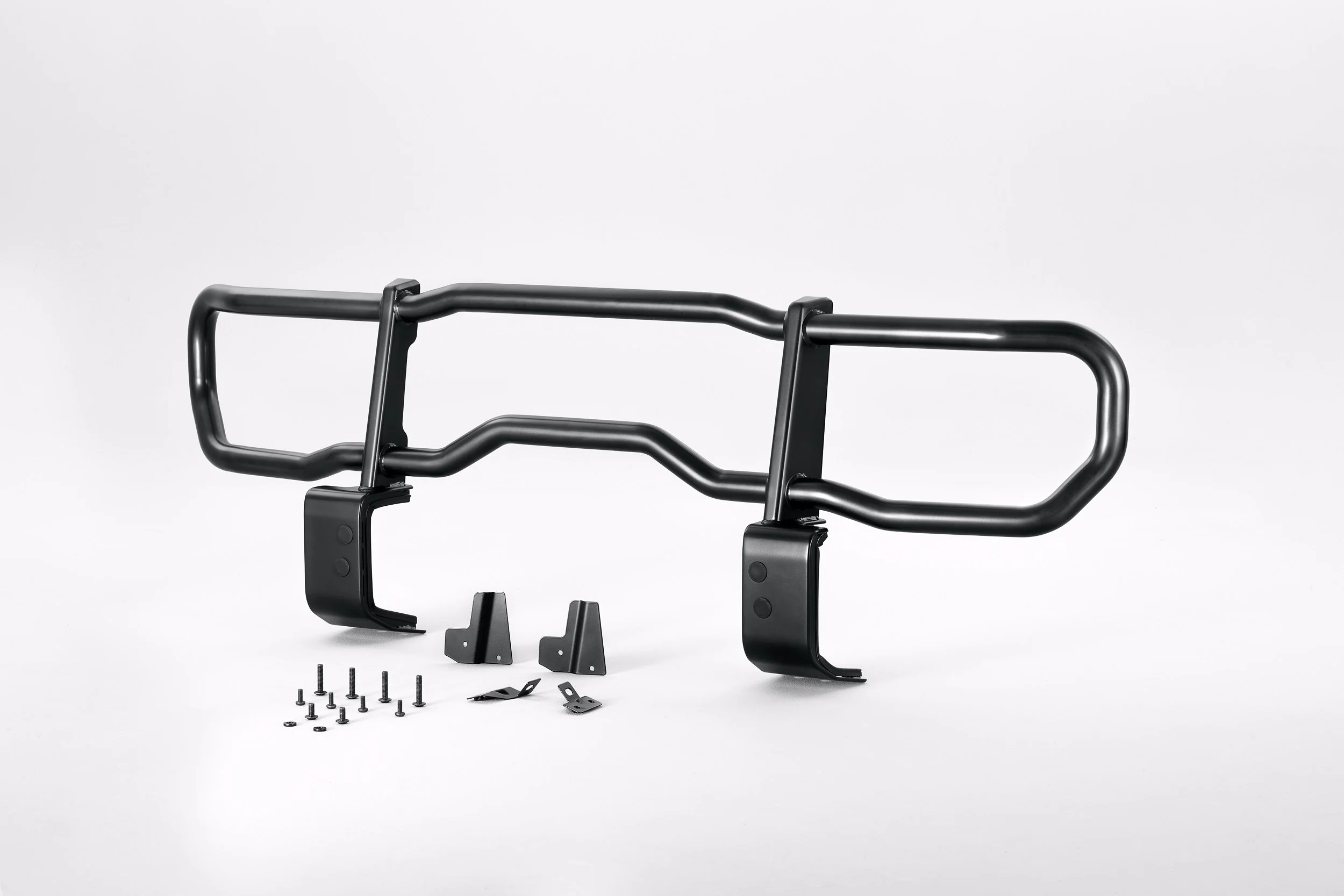 Black metal vehicle brush guard with mounting brackets and screws on a white background.