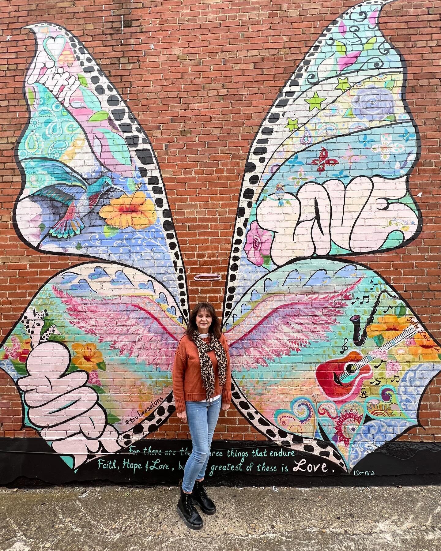 While we aren&rsquo;t open on Sundays, our beautiful mural always stands inviting, there for you to snap a photo as reminder that love endures. 🥰 Looking beautiful Tina! 🦋 Tag us in your pics! #trulovesalons #waxahachieart #artofwahachie #hachiebut