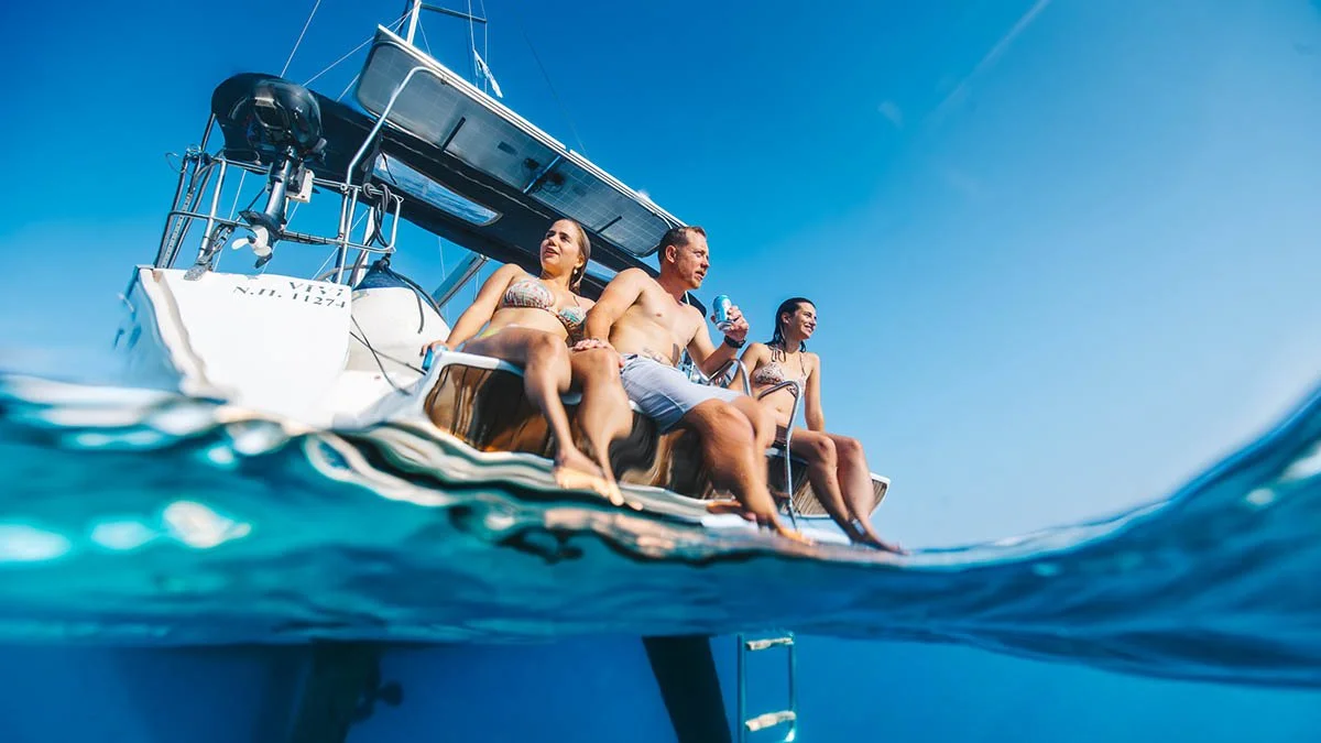 Premium Ionian marine photography capturing the luxury charter lifestyle and water activities. Professional Lefkas yacht photographer specializing in creative, multi-level imagery.