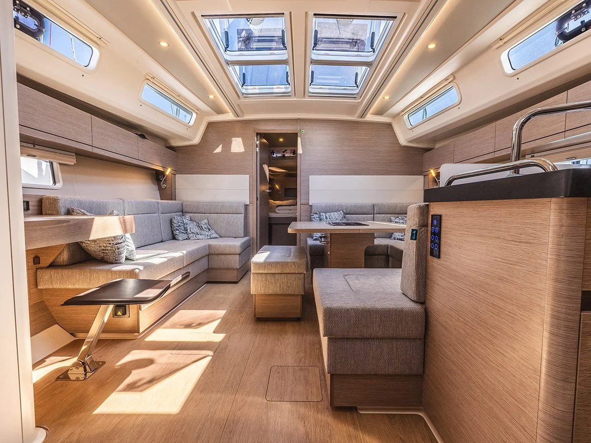 Professional interior yacht photography of a luxury catamaran saloon in Greece, showcasing clean lines, natural lighting, and high-end finishings for a brokerage sales listing.