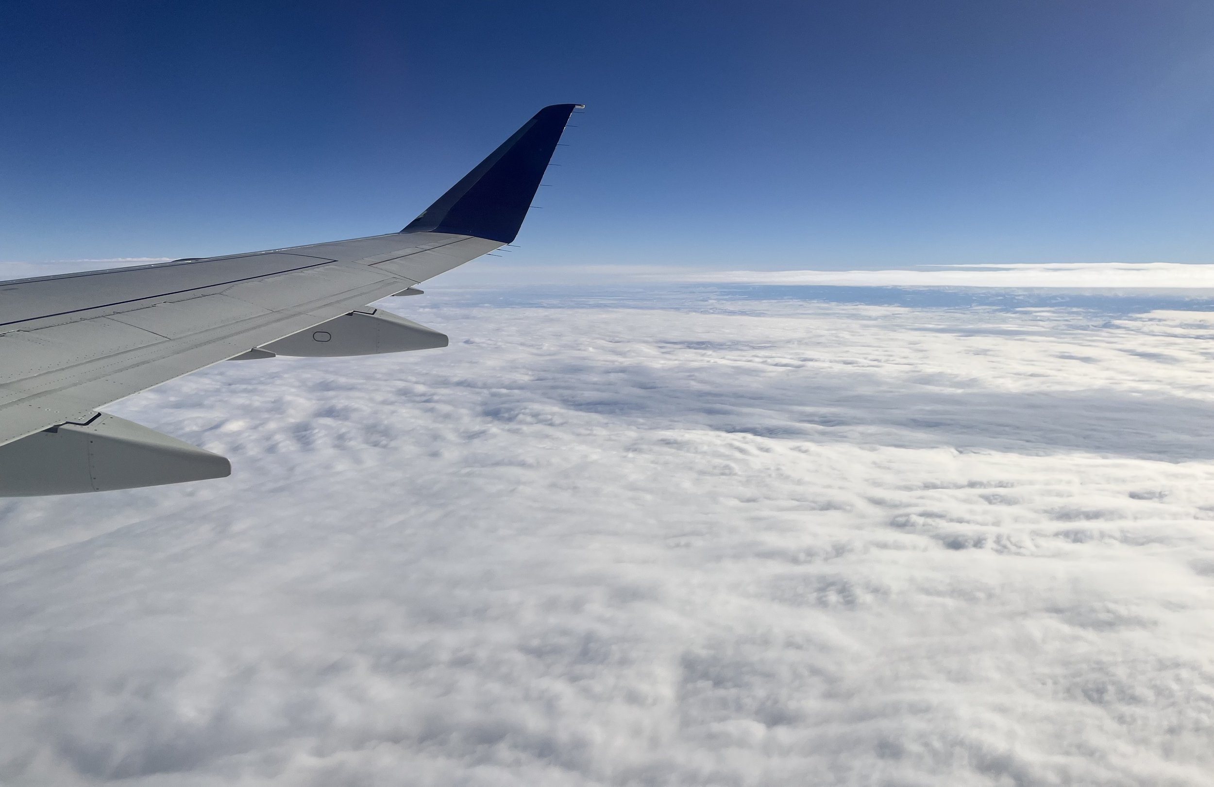 2-eric-airplane-wing-sky.jpg