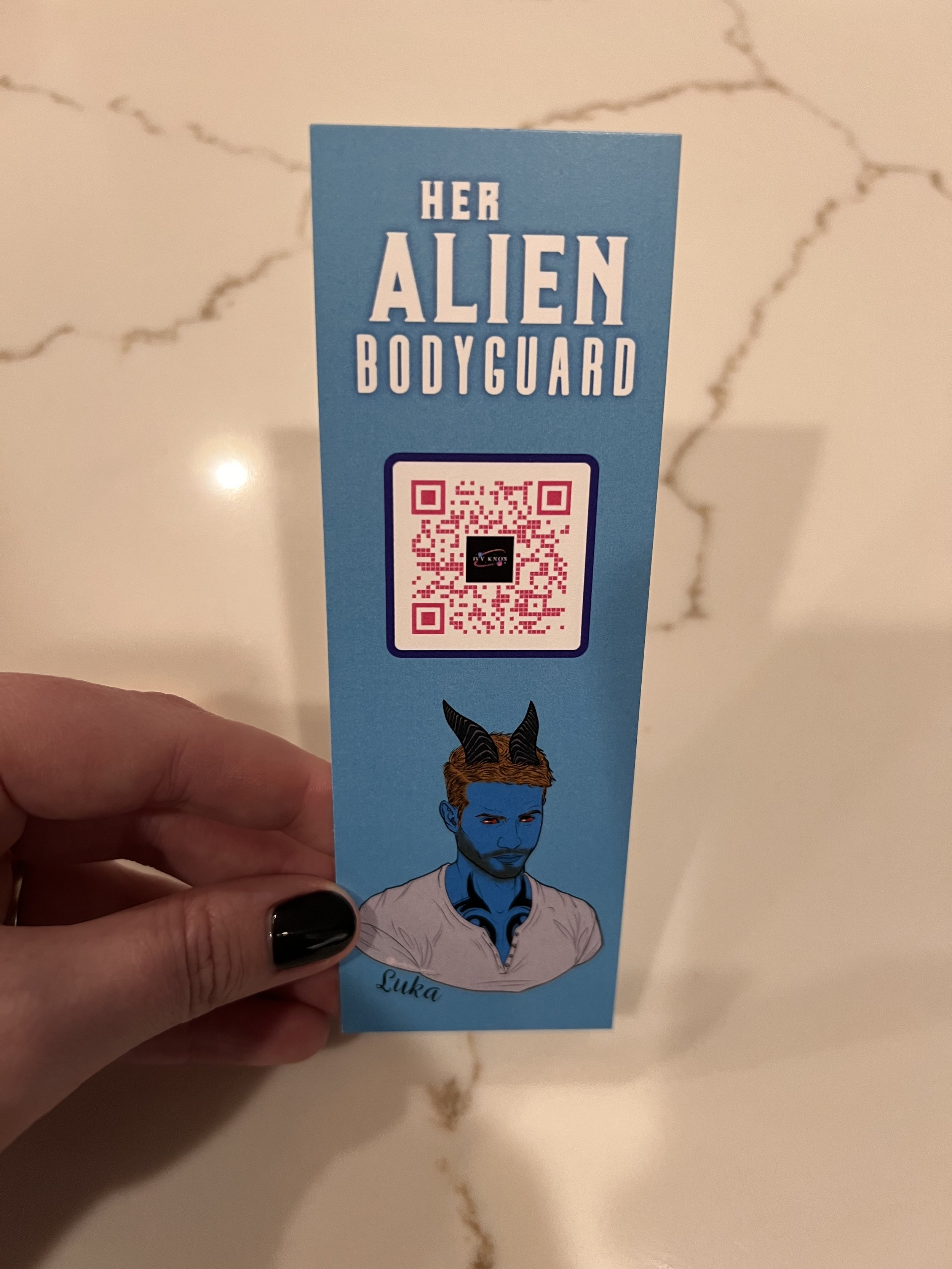 HAB bookmark front held.jpeg