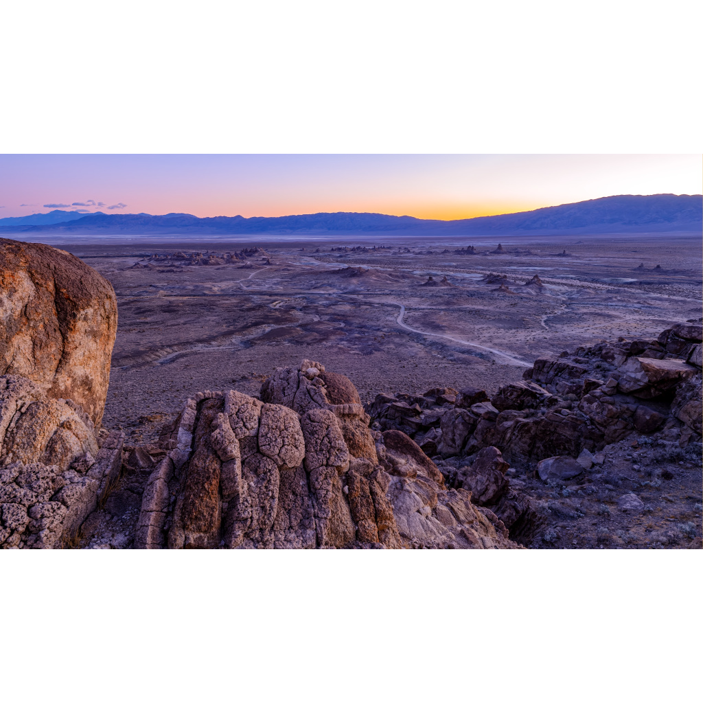 Trona Awakening – dramatic desert rock formations and dry lake bed at dawn in Trona California
