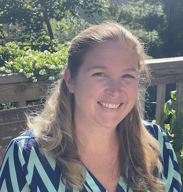 Headshot of Sarah Codere smiling at the camera