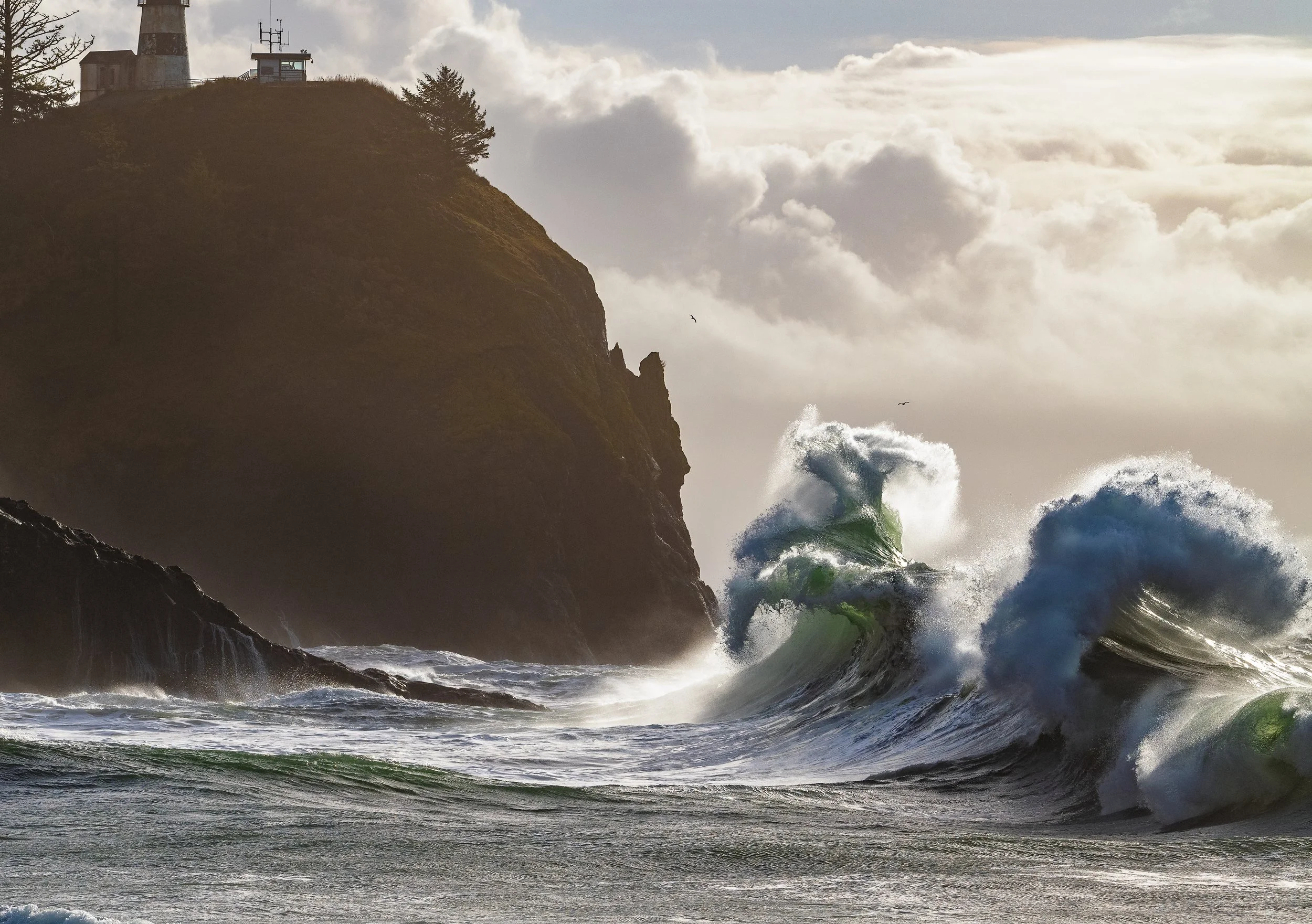 A Fine art landscape photograph during the King tides at Cape Disappointment, captured by Andrew Sambuceto.
