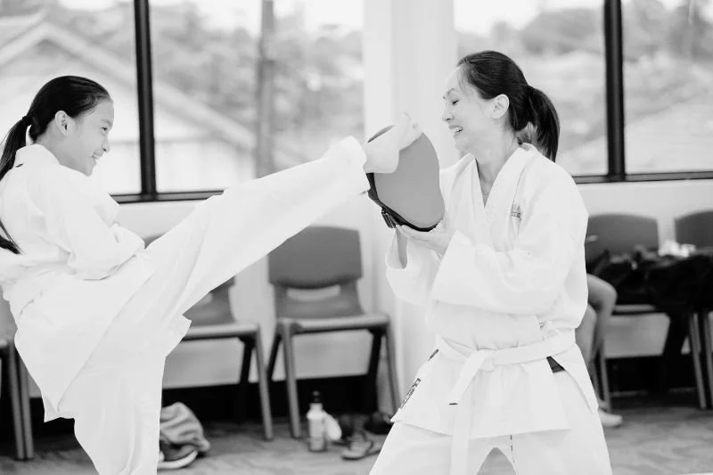 Parents and children training karate together as a family in at BBMA Hornsby