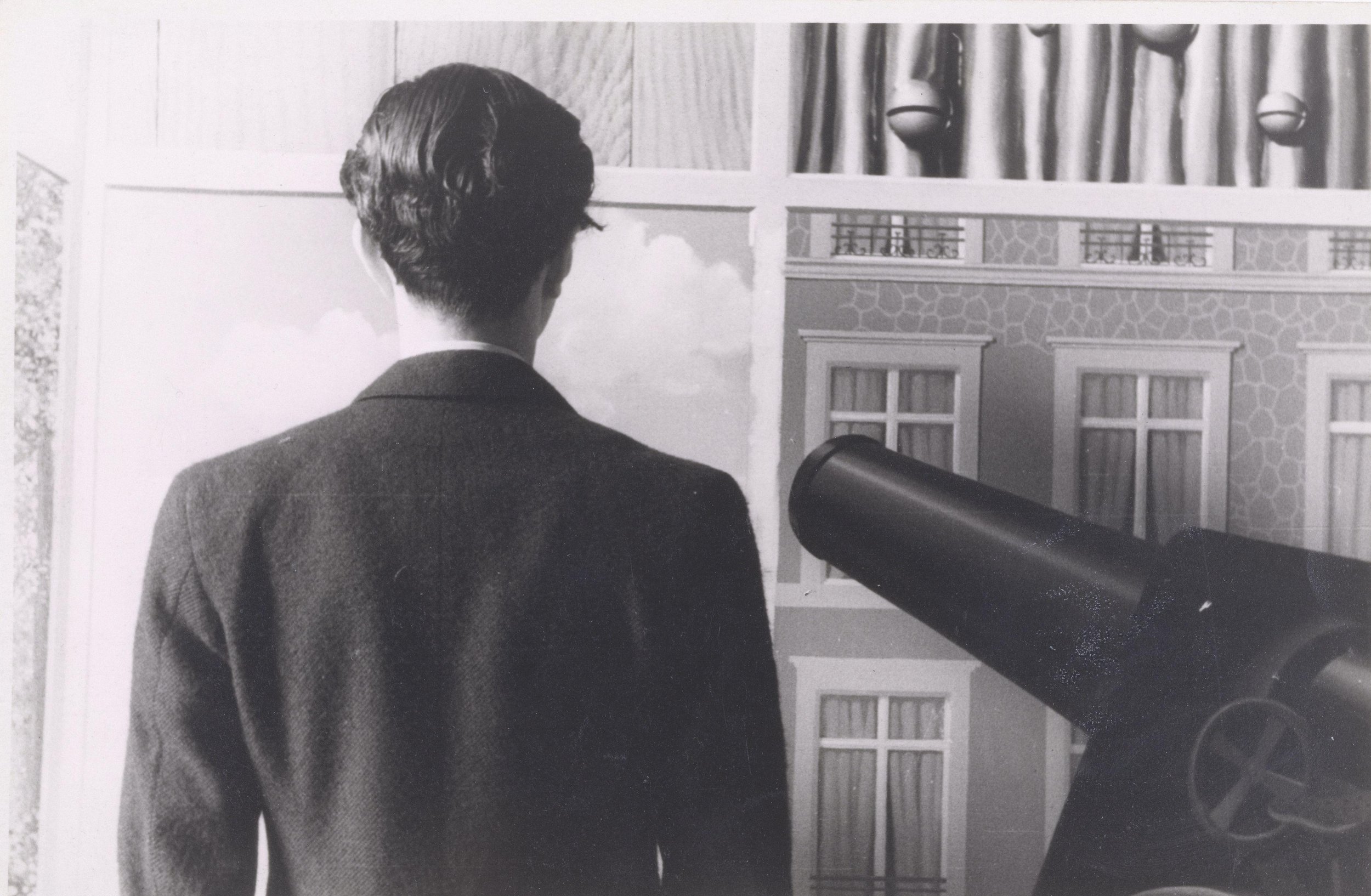 Figure 8. René Magritte, Edward James in front of “On the Threshold of Liberty”, 1937, photograph, The Metropolitan Museum of Art, New York.