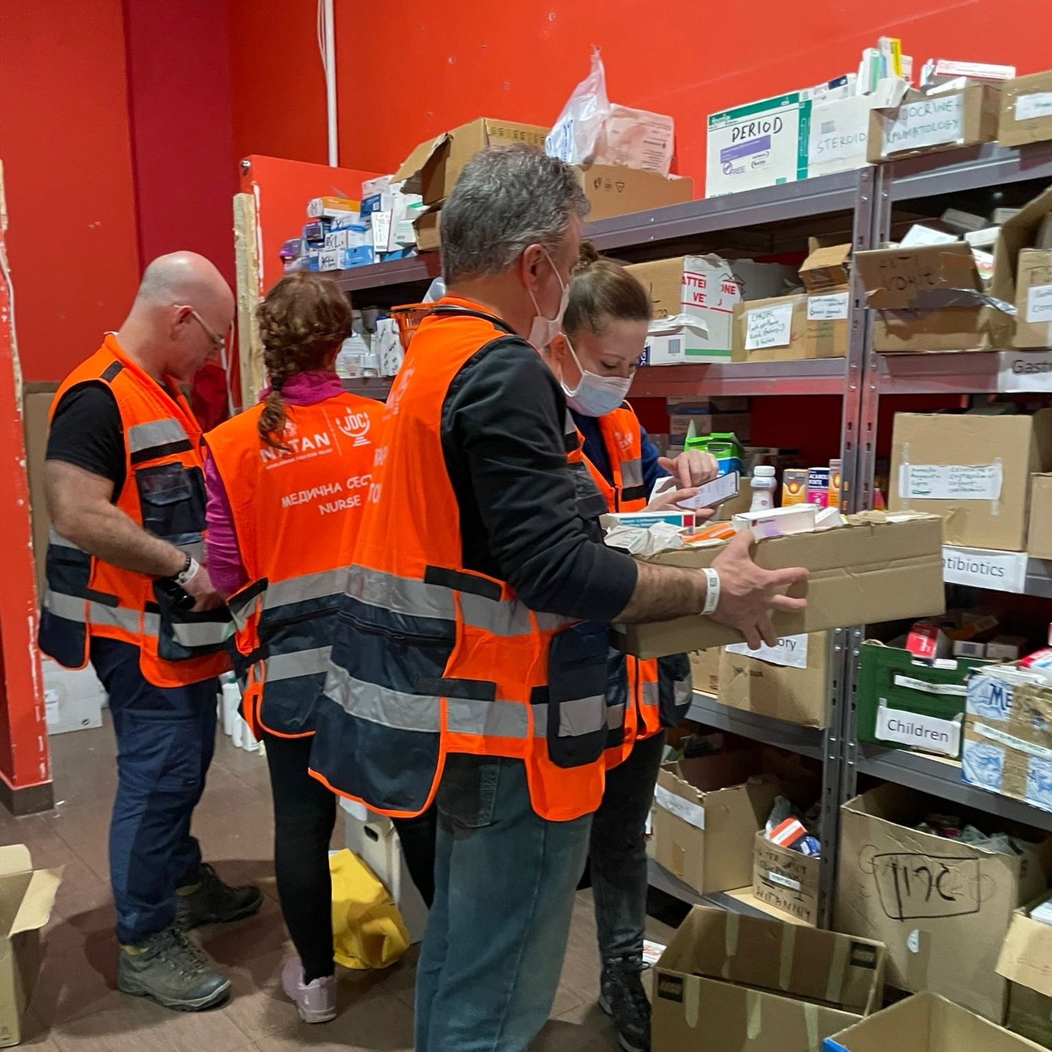 Checking supplies at NATAN's 'pharmacy' inside the first aid clinic in Przemysl Humanitarian Aid Center