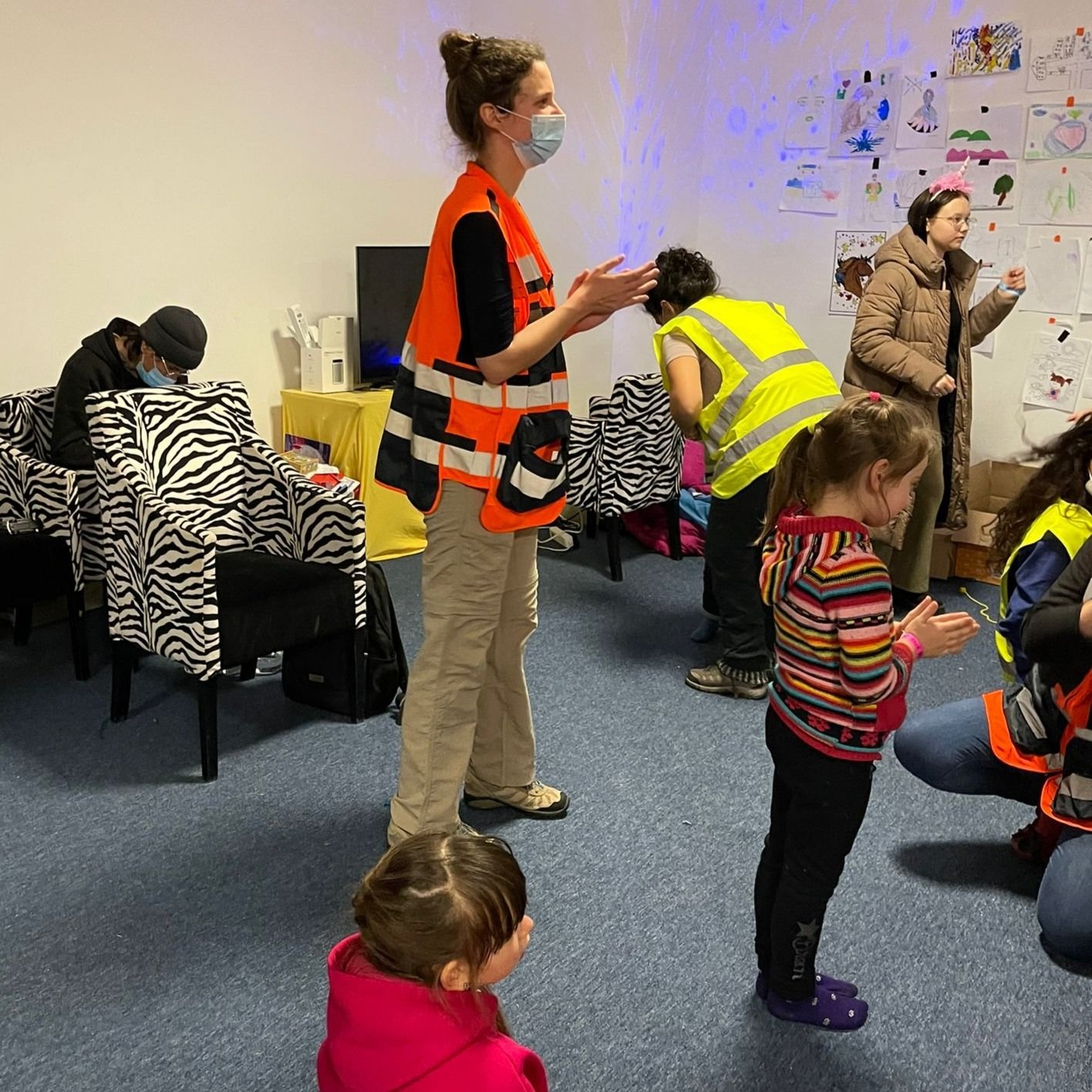 Social Worker Olla Stepchenko during activity in the children's play area