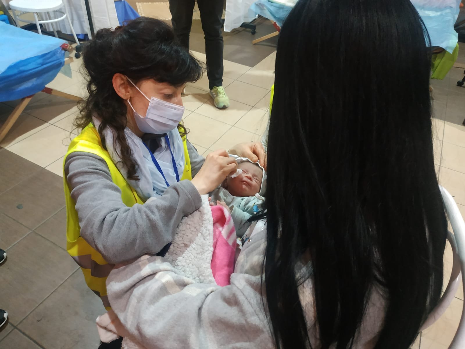 Cleaning the infant at the clinic