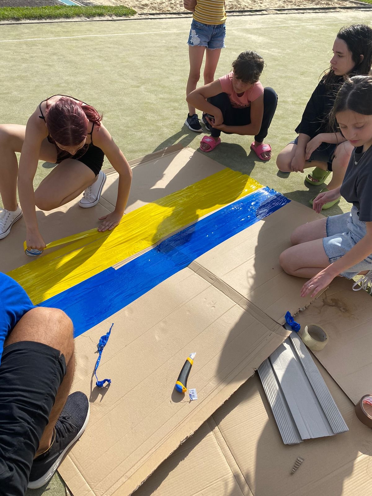 Campers prepare a Ukrainian themed crafts project