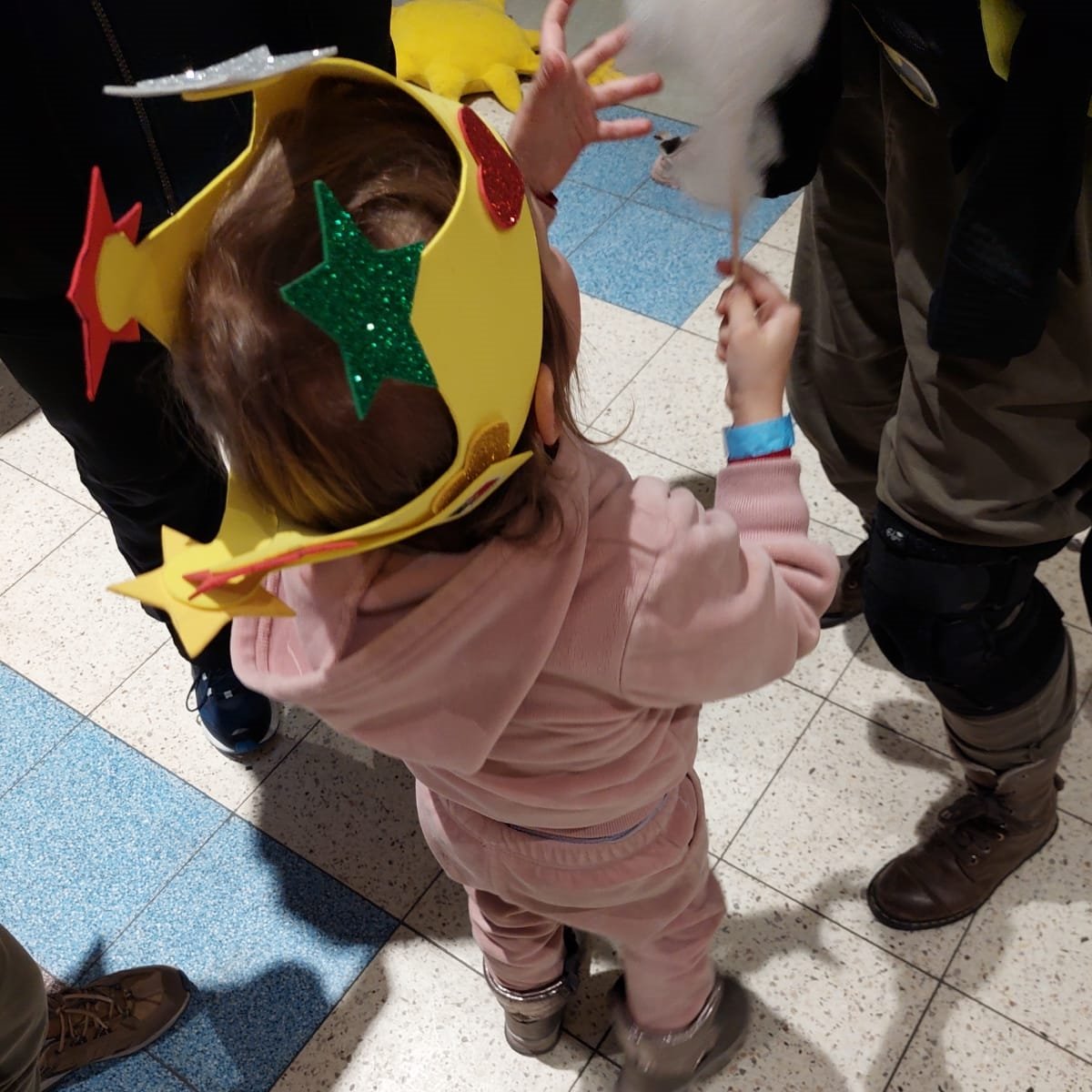 Child at the refugee center Purim party