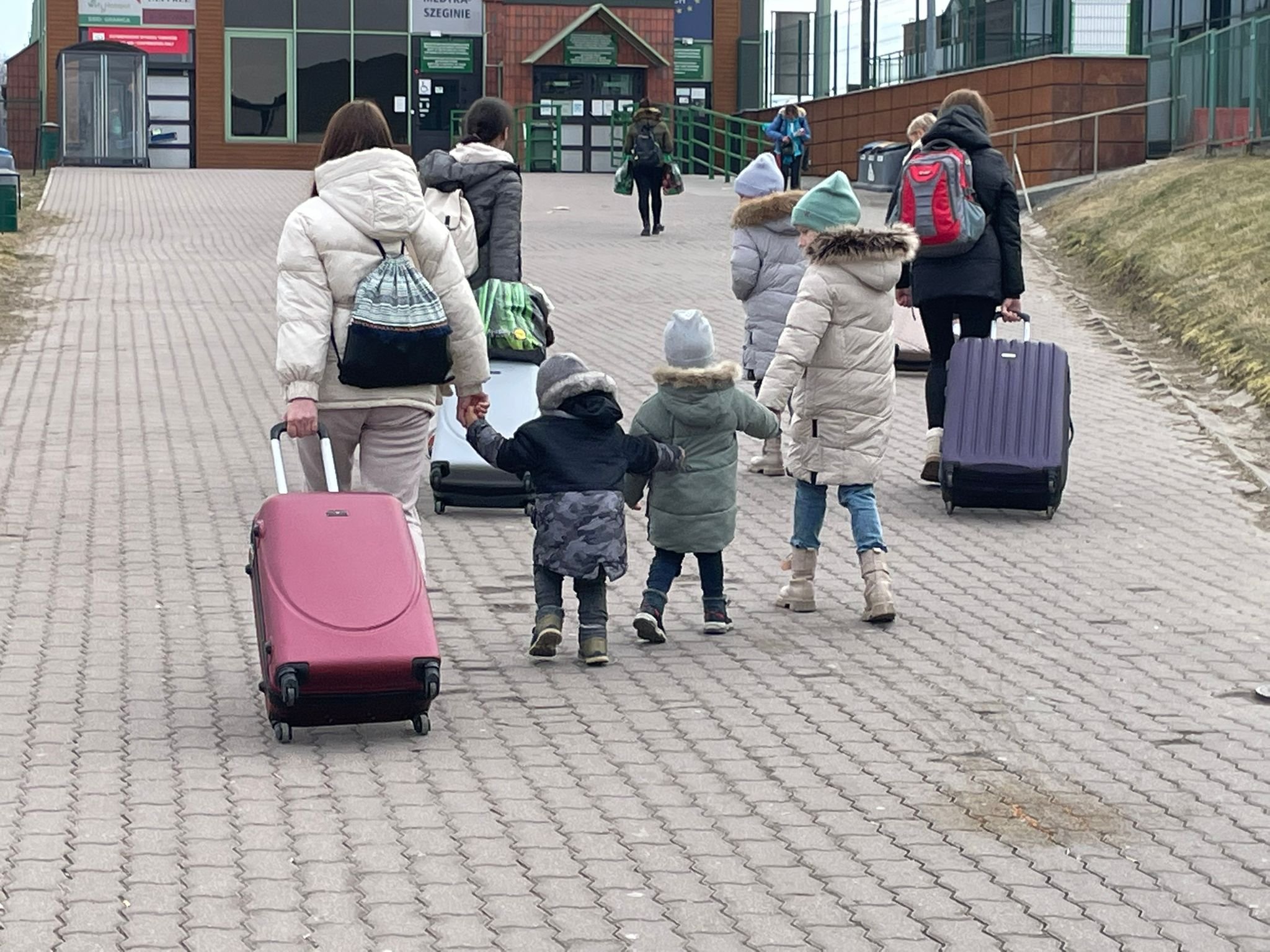 Ukrainian refugees on their way to border entry station: Village of Medyka, Poland