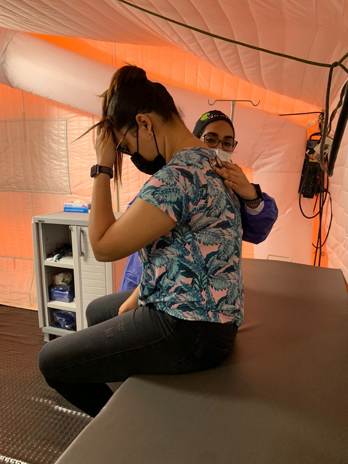 Doctor performs exam at the medical clinic for migrant women in Cucuta Colombia