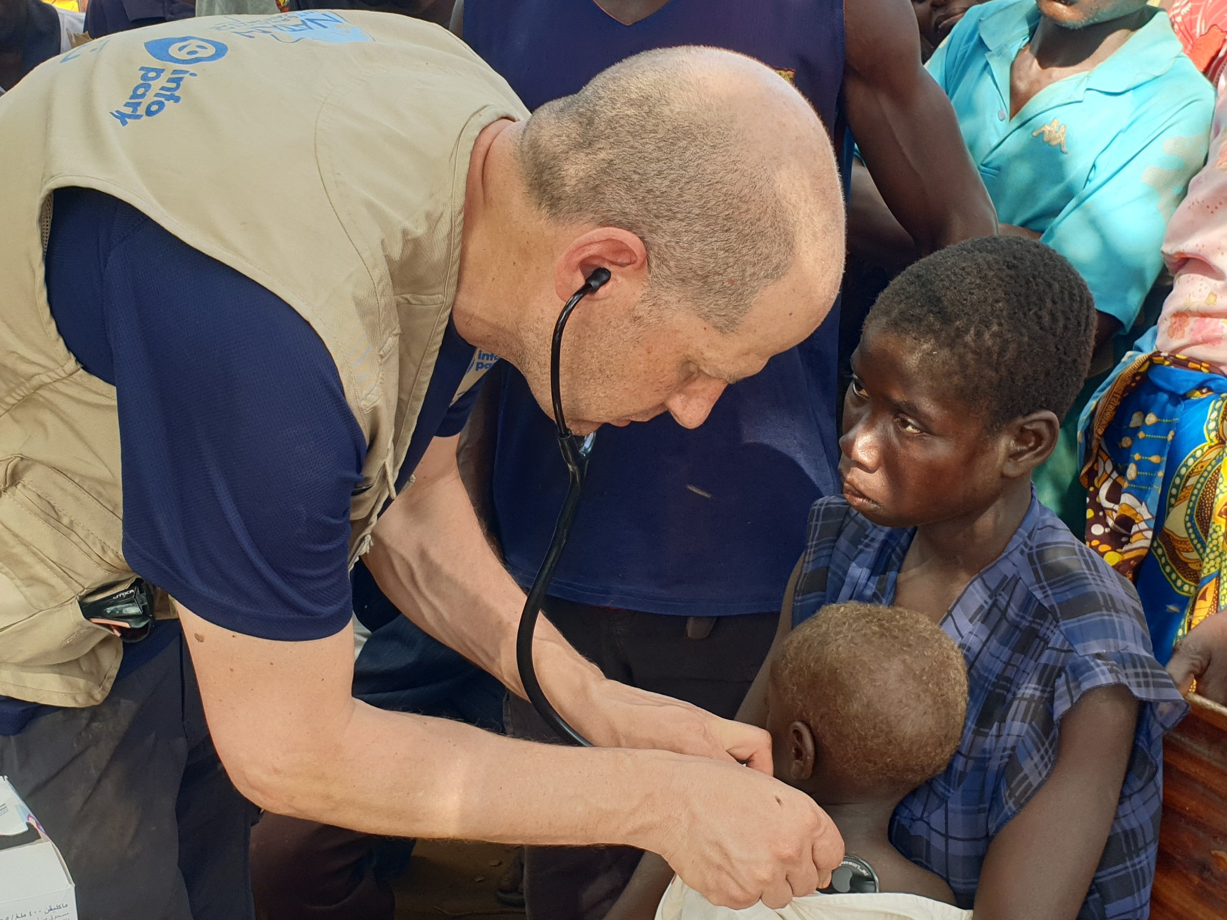 NATAN MEDIC TREATS PATIENTS AT OUTDOOR FIELD CLINIC NEAR BEIRA MOZAMBIQUE FOLLOWING CYCLONE IDAI - 2019