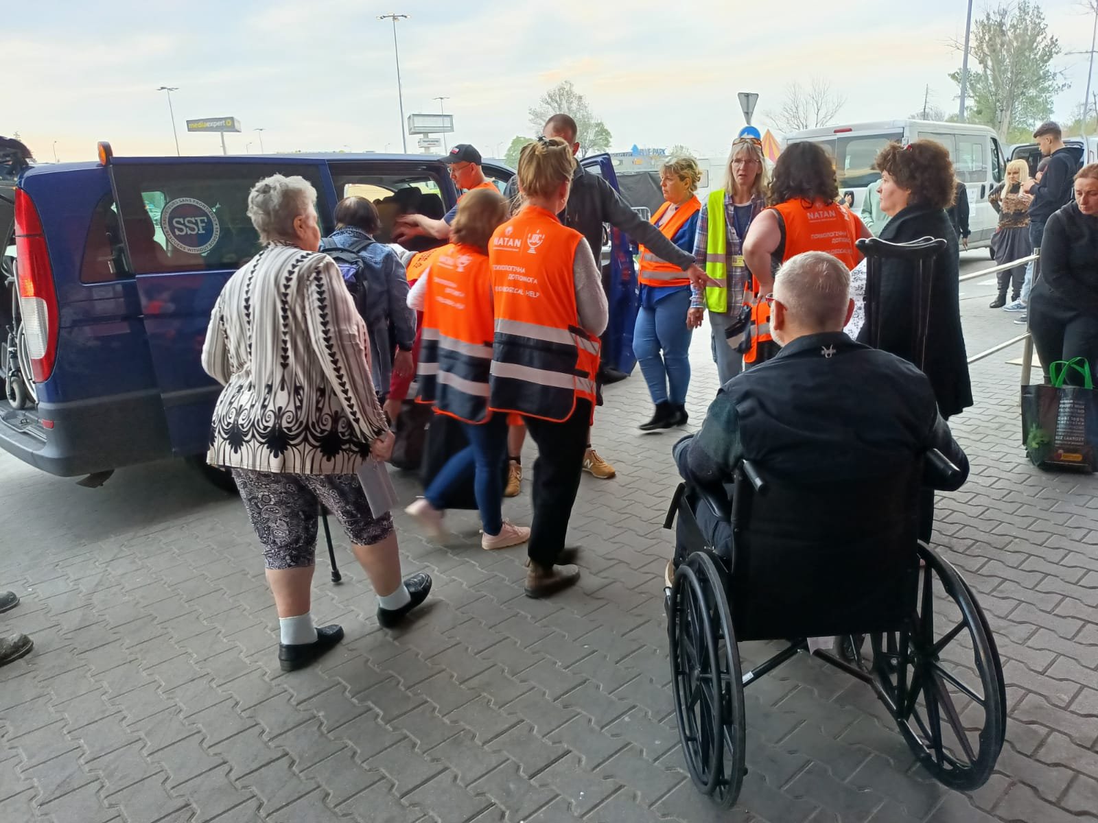 A transport organized and coordinated by NATAN of 4 disabled people and their family members. They are enroute to Germany in a special train where they can travel lying down. NATAN also coordinated the different facilities in Germany that will accept